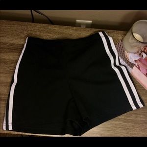 Black shorts with white stripes